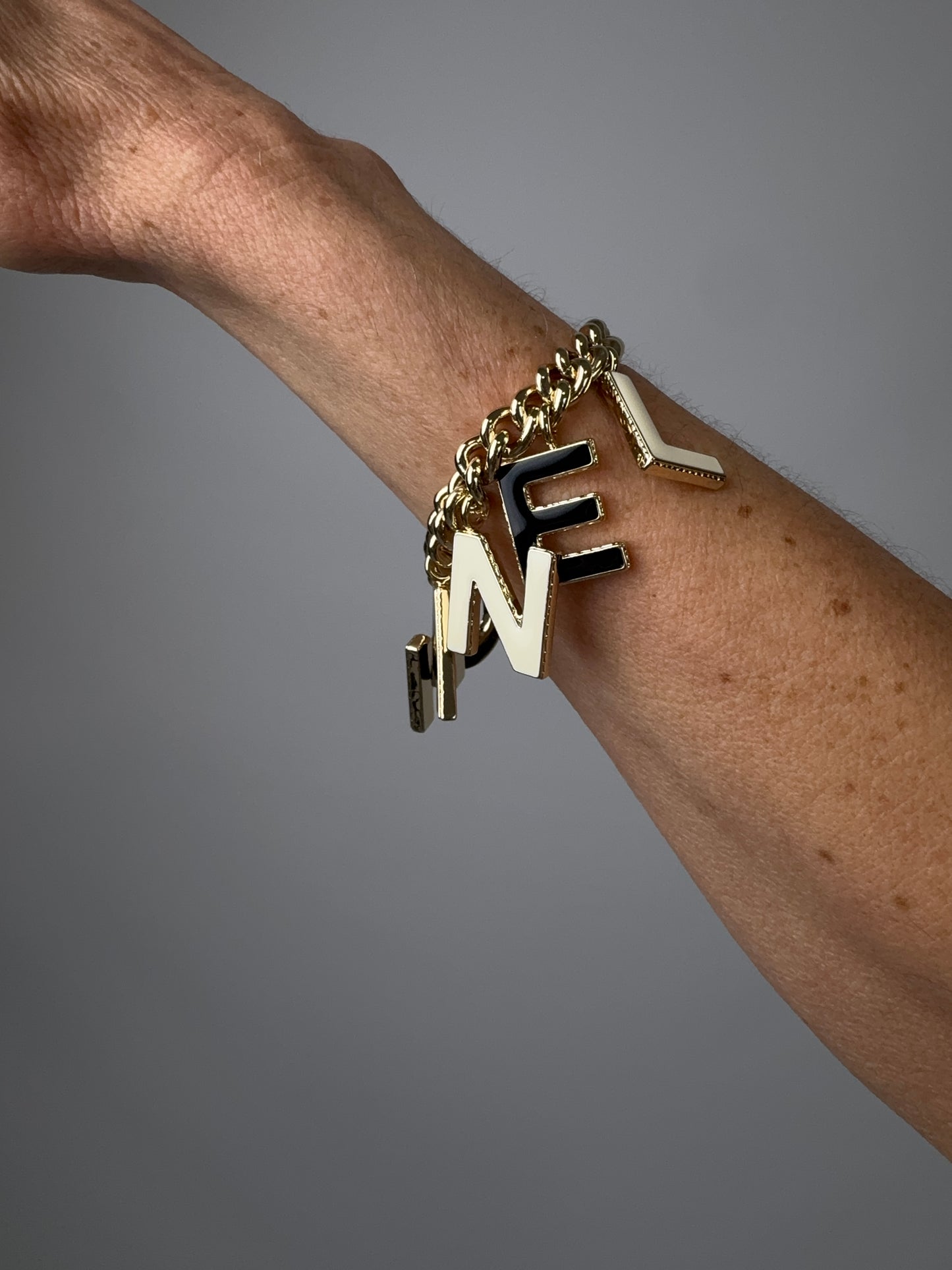 Chanel Logo Charm Bracelet — Black & White Enamel