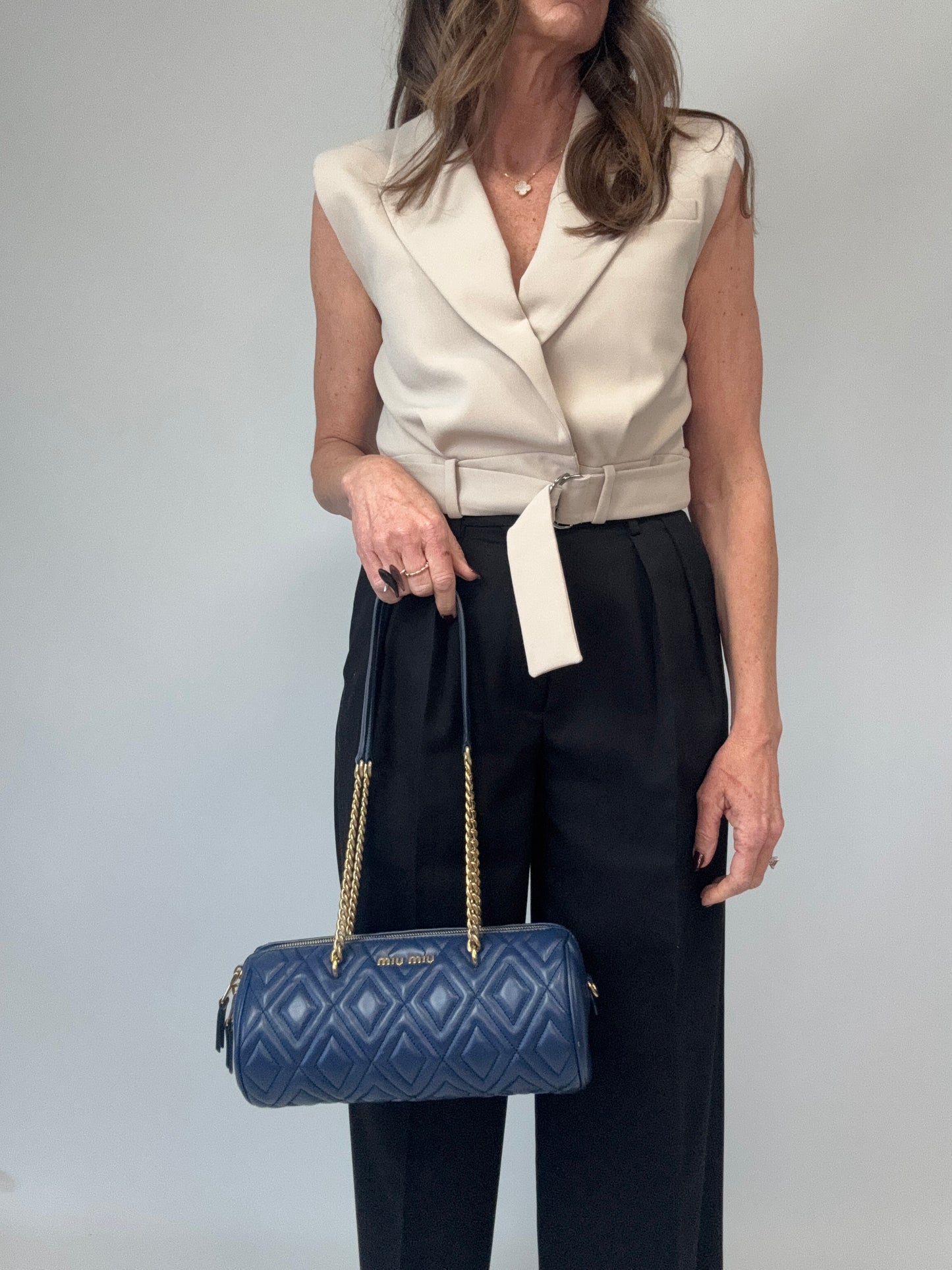 Miu Miu Diamond Quilted Cylinder Bag in Blue modeled 3
