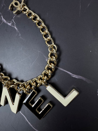 Chanel Logo Charm Bracelet — Black & White Enamel