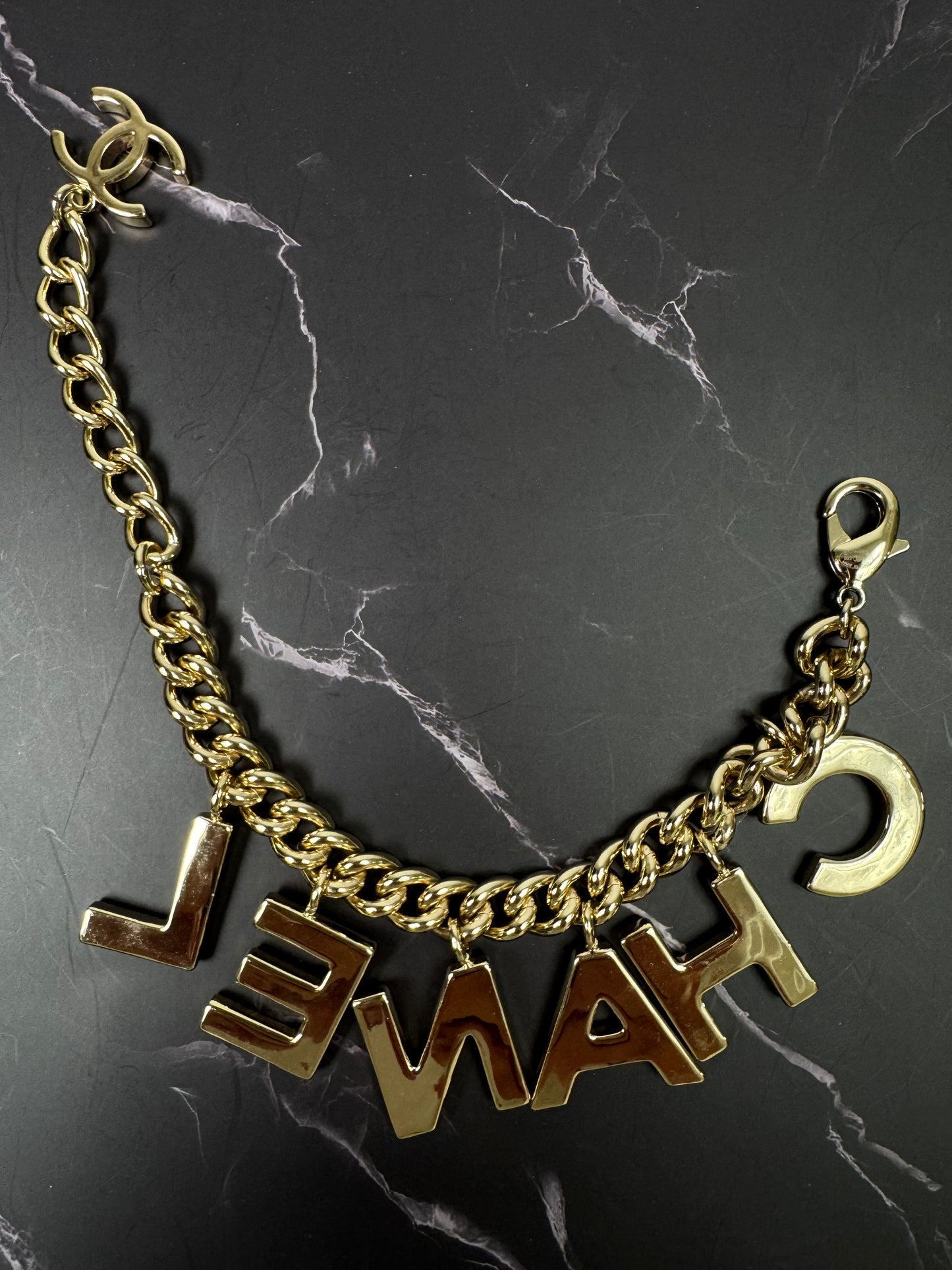 Chanel Logo Charm Bracelet — Black & White Enamel