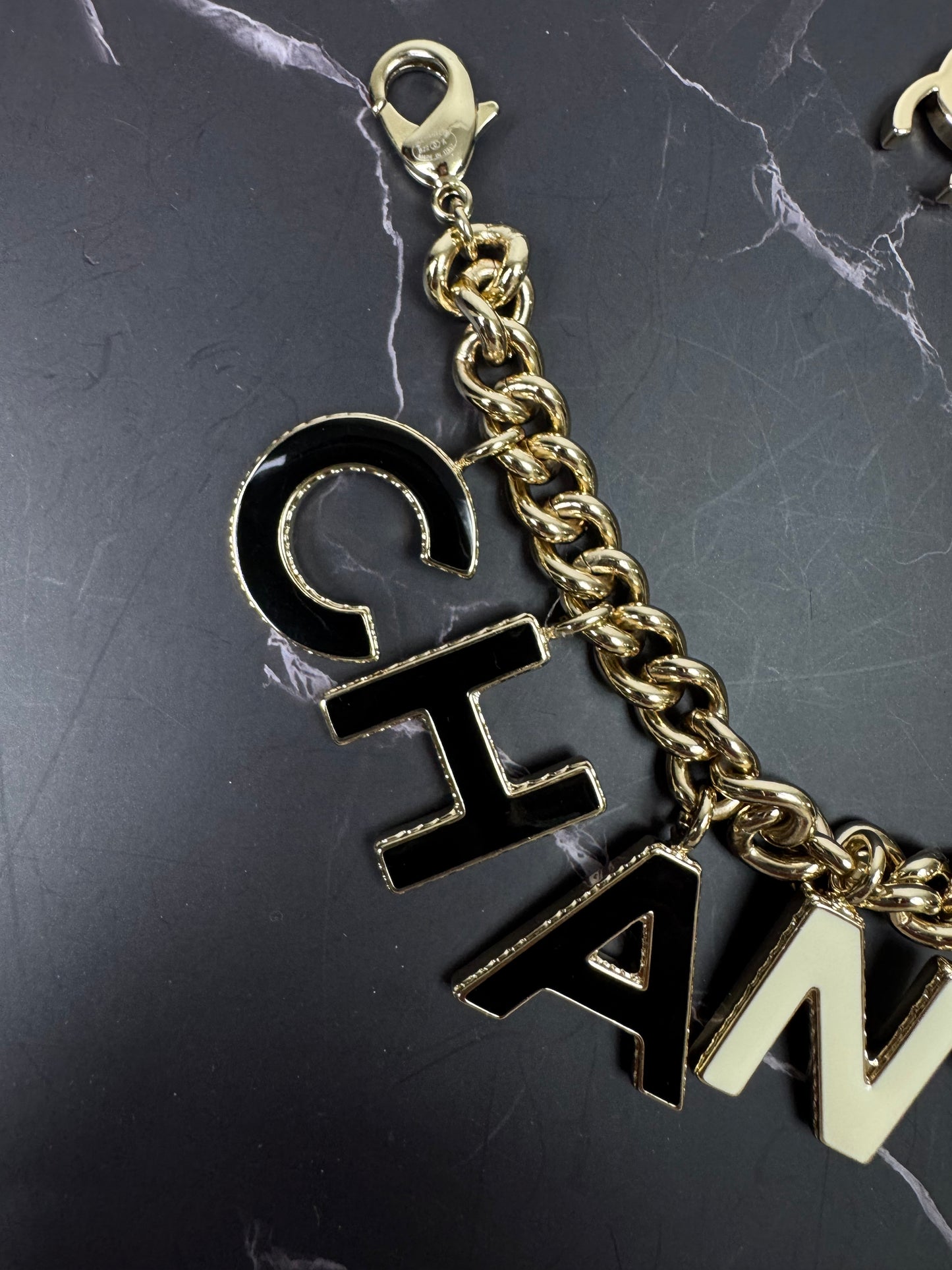 Chanel Logo Charm Bracelet — Black & White Enamel