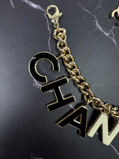 Chanel Logo Charm Bracelet — Black & White Enamel