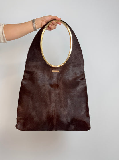 Gucci by Tom Ford oversized shoulder bag in brown pony hair from the Fall/Winter 1996 runway collection. Front of Bag