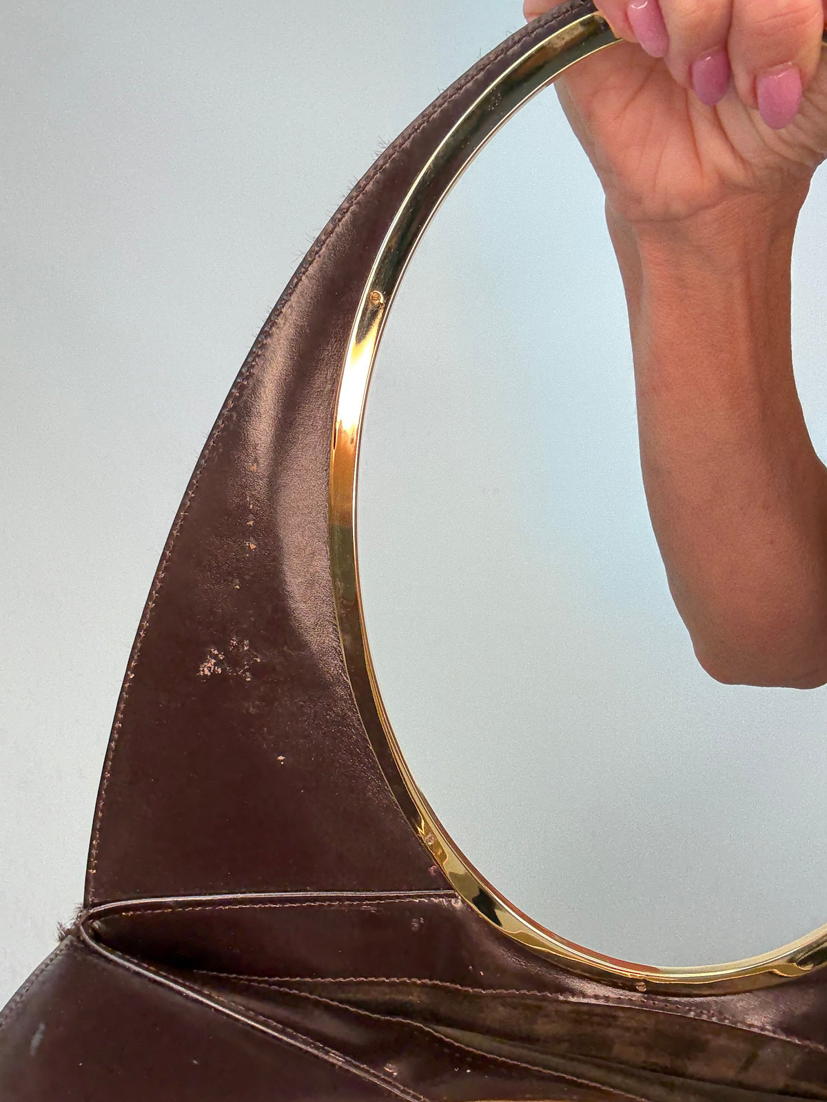 Gucci by Tom Ford oversized shoulder bag in brown pony hair from the Fall/Winter 1996 runway collection.
Inside Left Handle