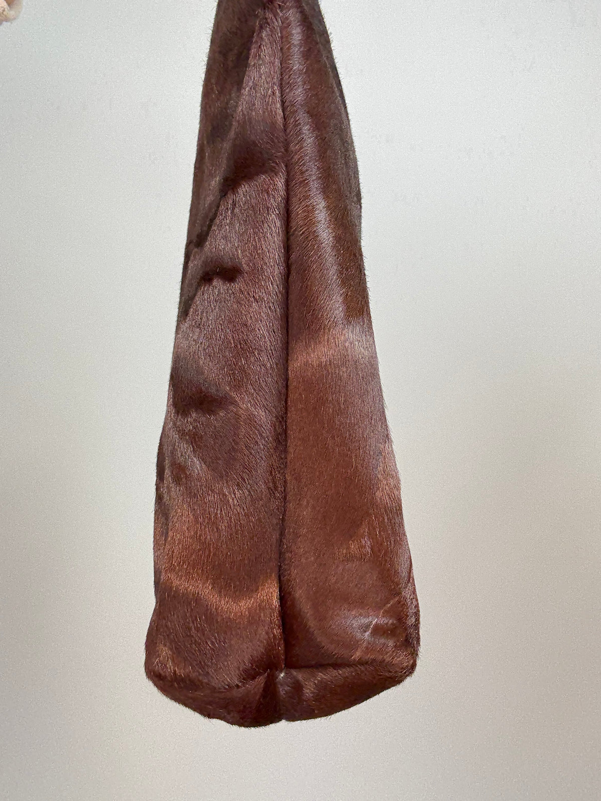Gucci by Tom Ford oversized shoulder bag in brown pony hair from the Fall/Winter 1996 runway collection.
Left Side of Bag Close-up