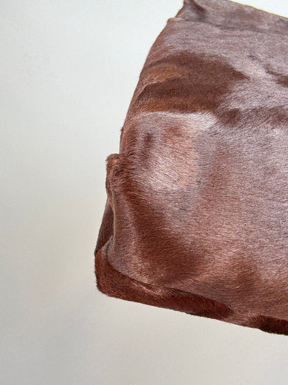 Gucci by Tom Ford oversized shoulder bag in brown pony hair from the Fall/Winter 1996 runway collection.
Left Side of Bag Close-up
