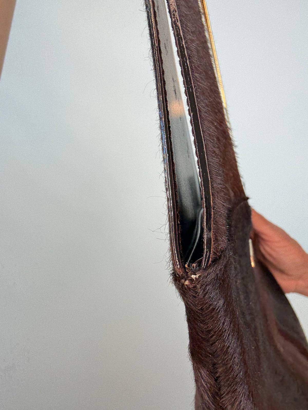 Gucci by Tom Ford oversized shoulder bag in brown pony hair from the Fall/Winter 1996 runway collection. Right Side of Bag Close-up