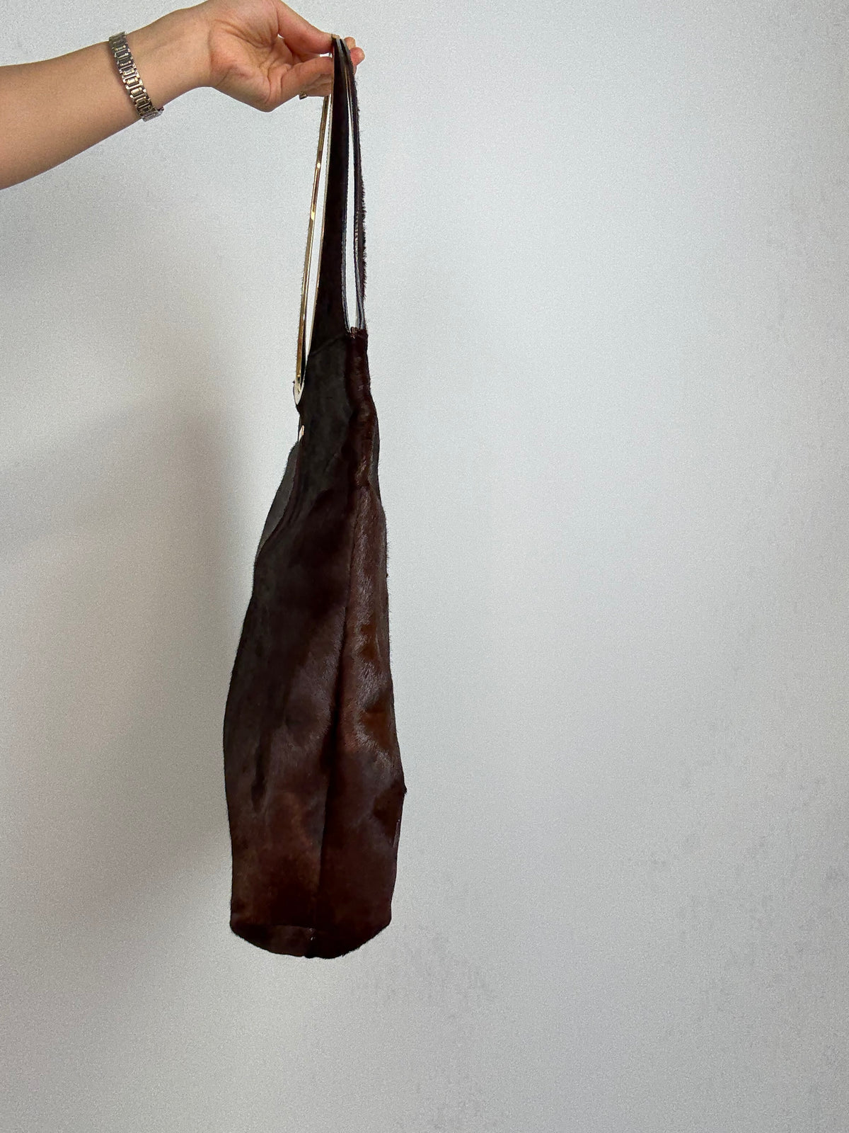 Gucci by Tom Ford oversized shoulder bag in brown pony hair from the Fall/Winter 1996 runway collection.
Right Side of Bag