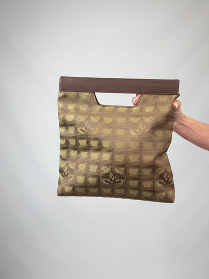 Chanel Travel Clutch – CC Monogram Jacquard & Leather