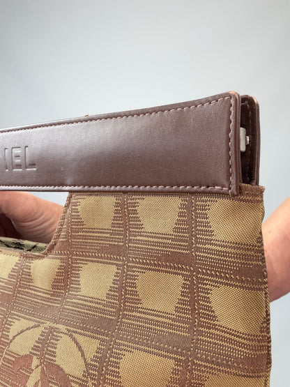 Chanel Travel Clutch – CC Monogram Jacquard & Leather