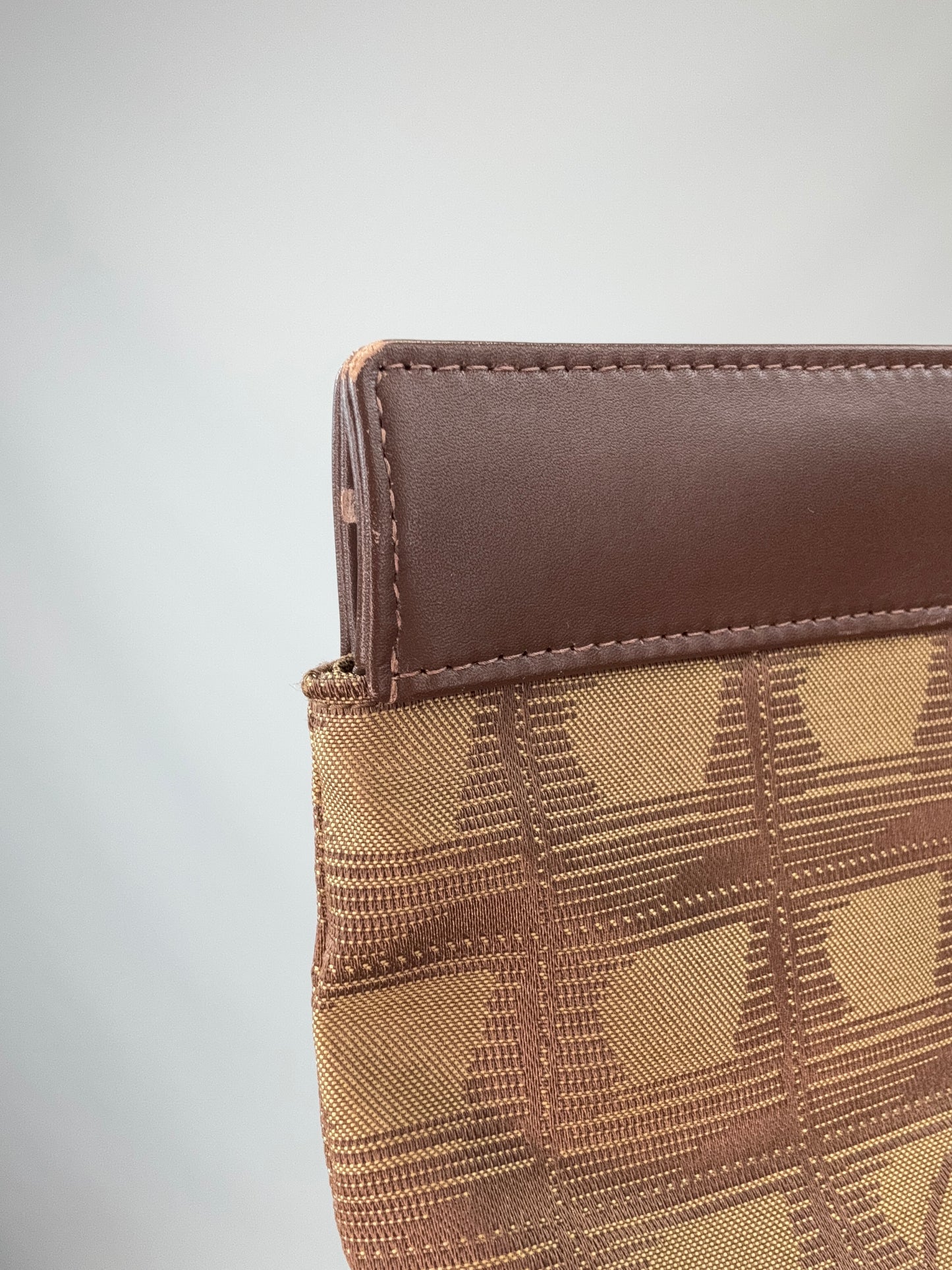 Chanel Travel Clutch – CC Monogram Jacquard & Leather