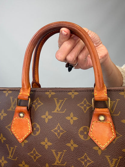 Louis Vuitton Monogram Triangle Sac-Vintage