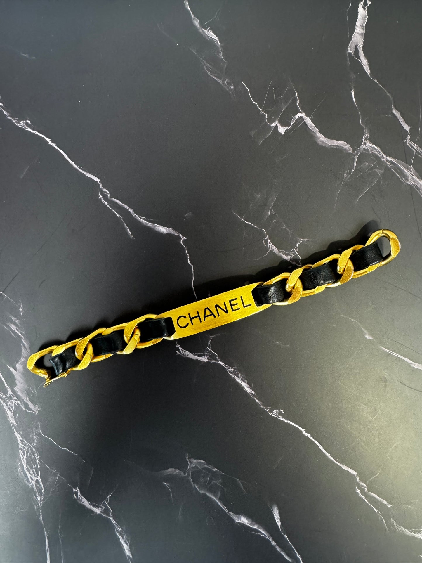 Chanel vintage signature plate leather bracelet