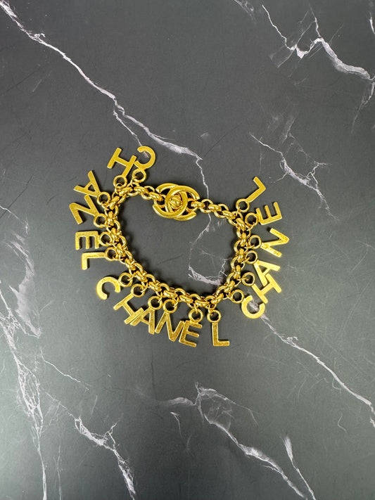 Chanel Vintage Turnlock Letter Charm Bracelet (1996)