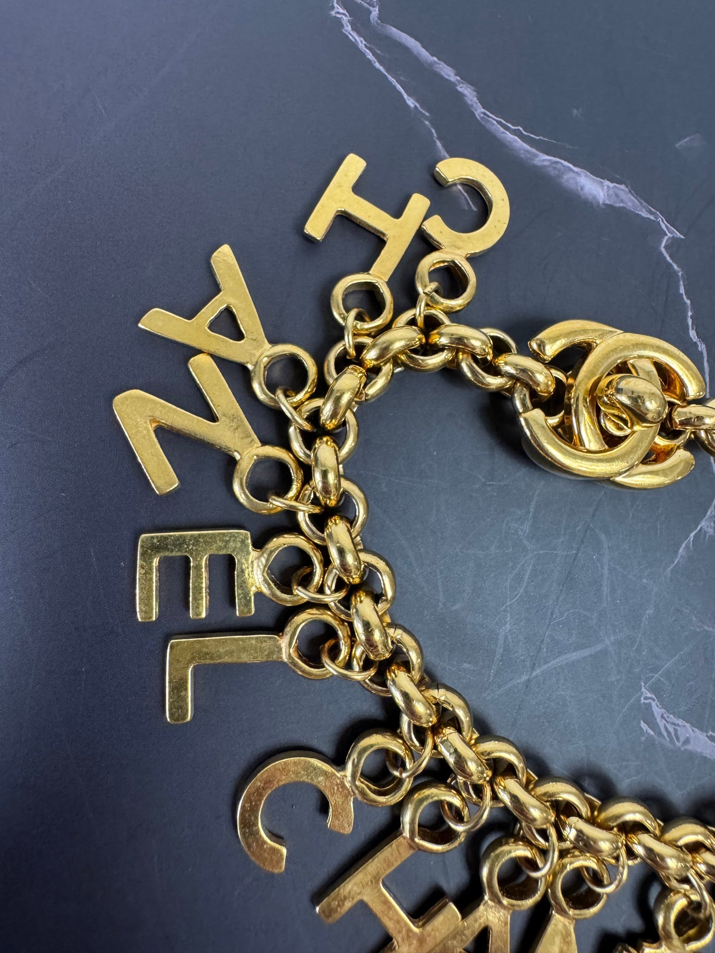 Chanel Vintage Turnlock Letter Charm Bracelet (1996)