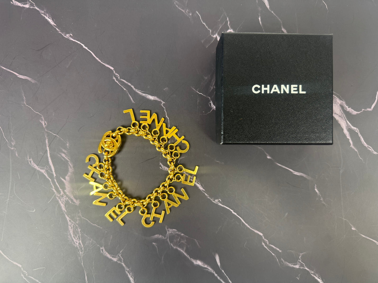Chanel Vintage Turnlock Letter Charm Bracelet (1996)