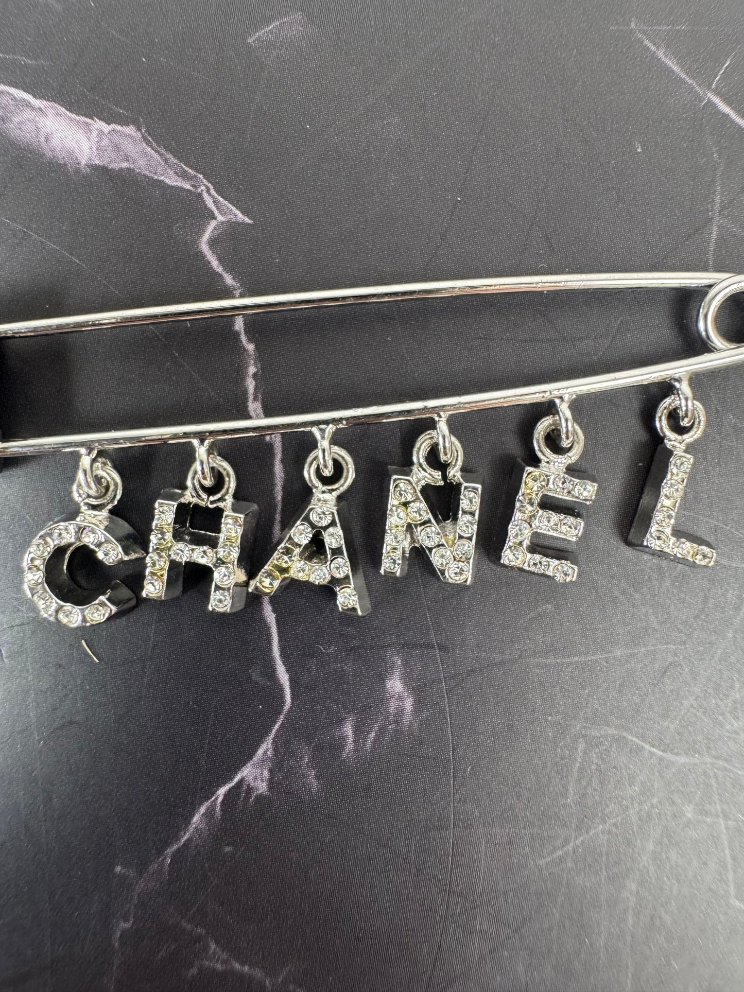 Chanel Safety Pin Letter Brooch (2003)