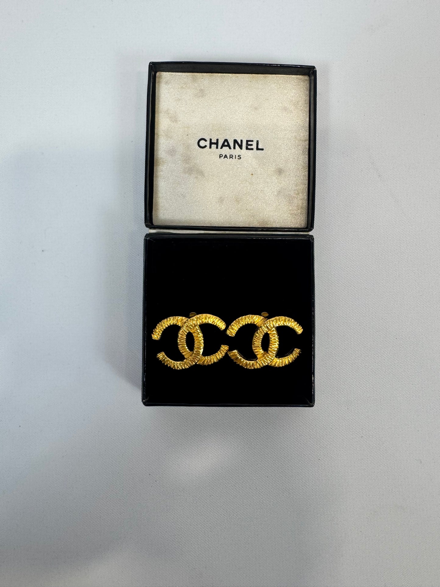 Chanel CC Hammered Clip On Earrings
