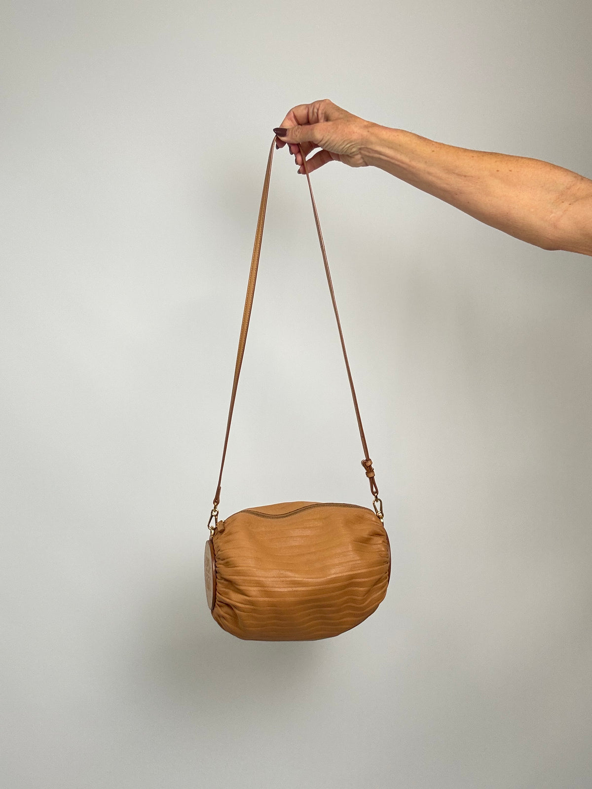 Loewe Women’s Cylinder Leather Bracelet Pouch — Caramel Tan