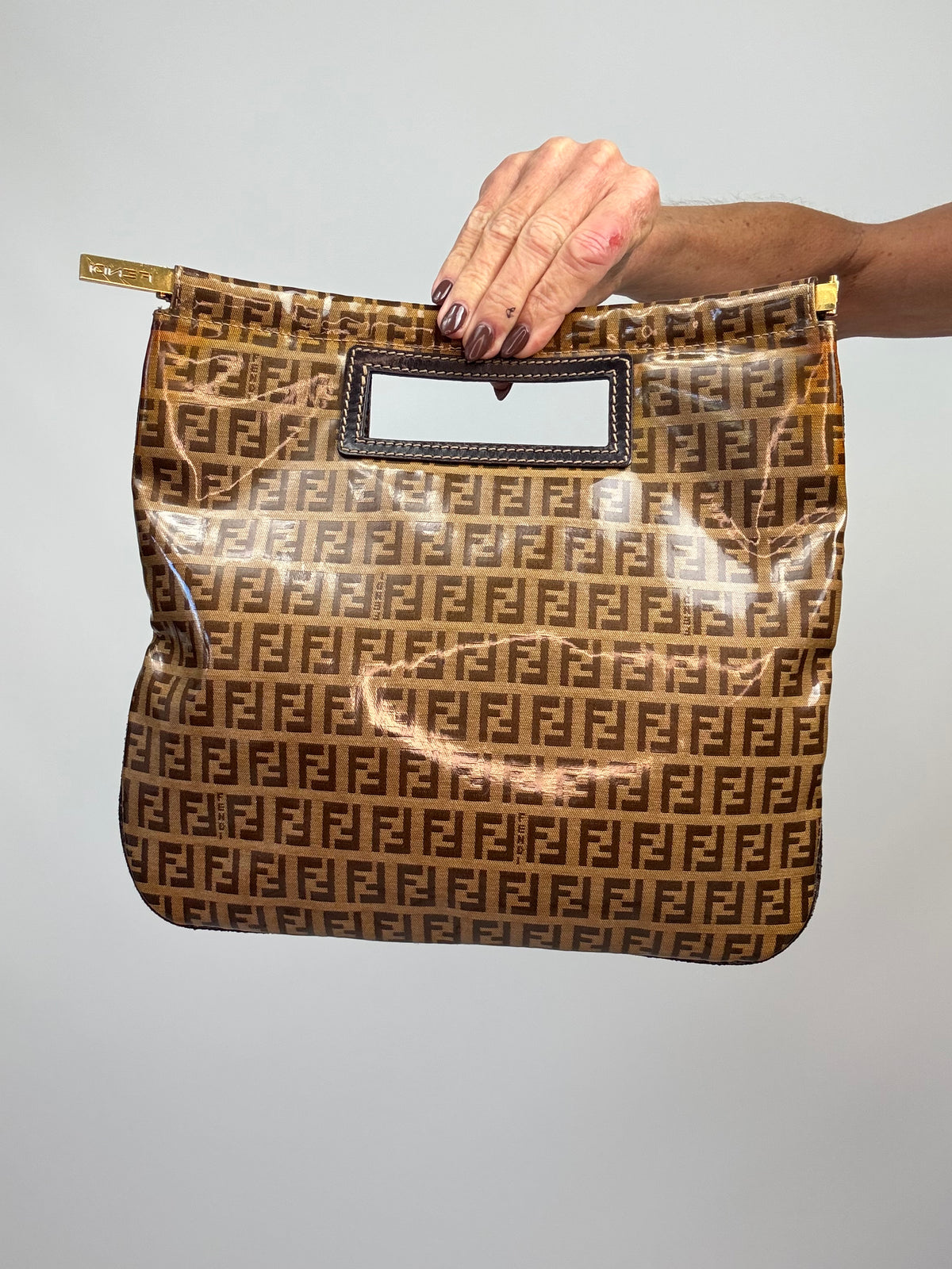 Fendi Vintage Zucca Monogram Coated Canvas Cutout Handle Tote — Tobacco Brown.