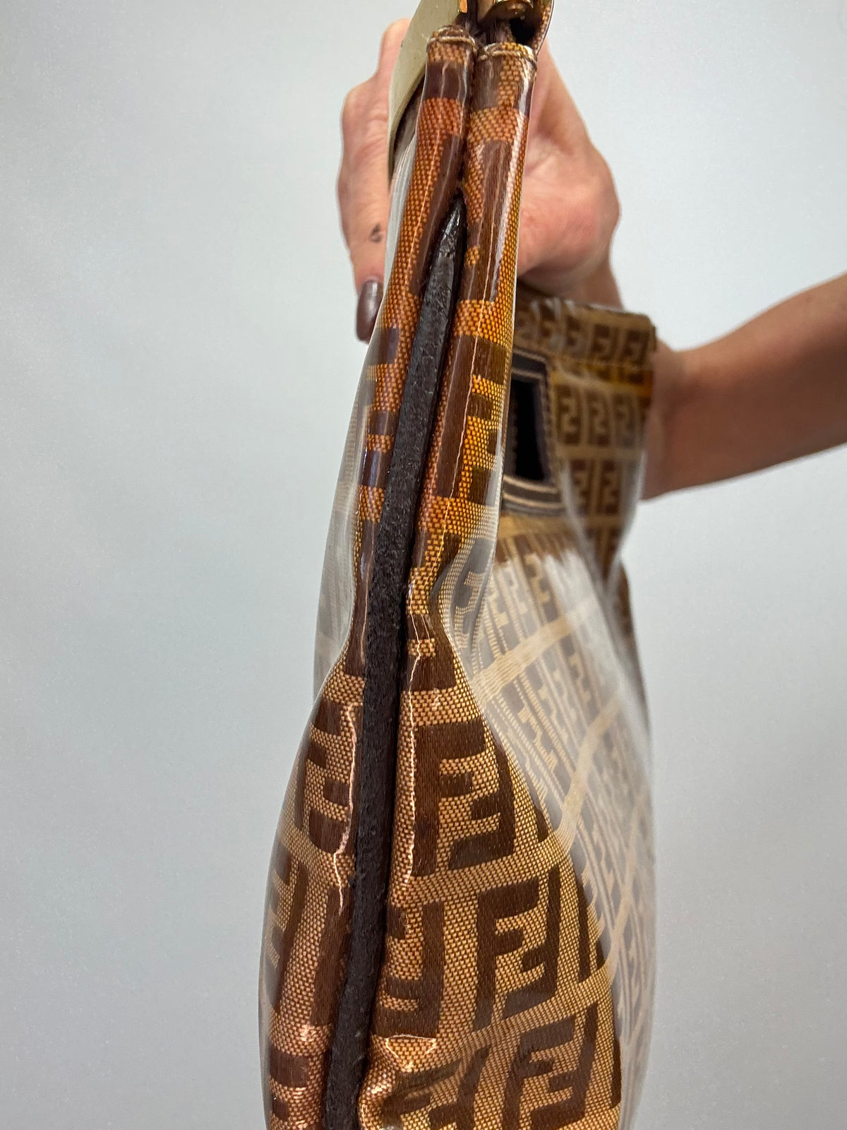 Fendi Vintage Zucca Monogram Coated Canvas Cutout Handle Tote — Tobacco Brown.