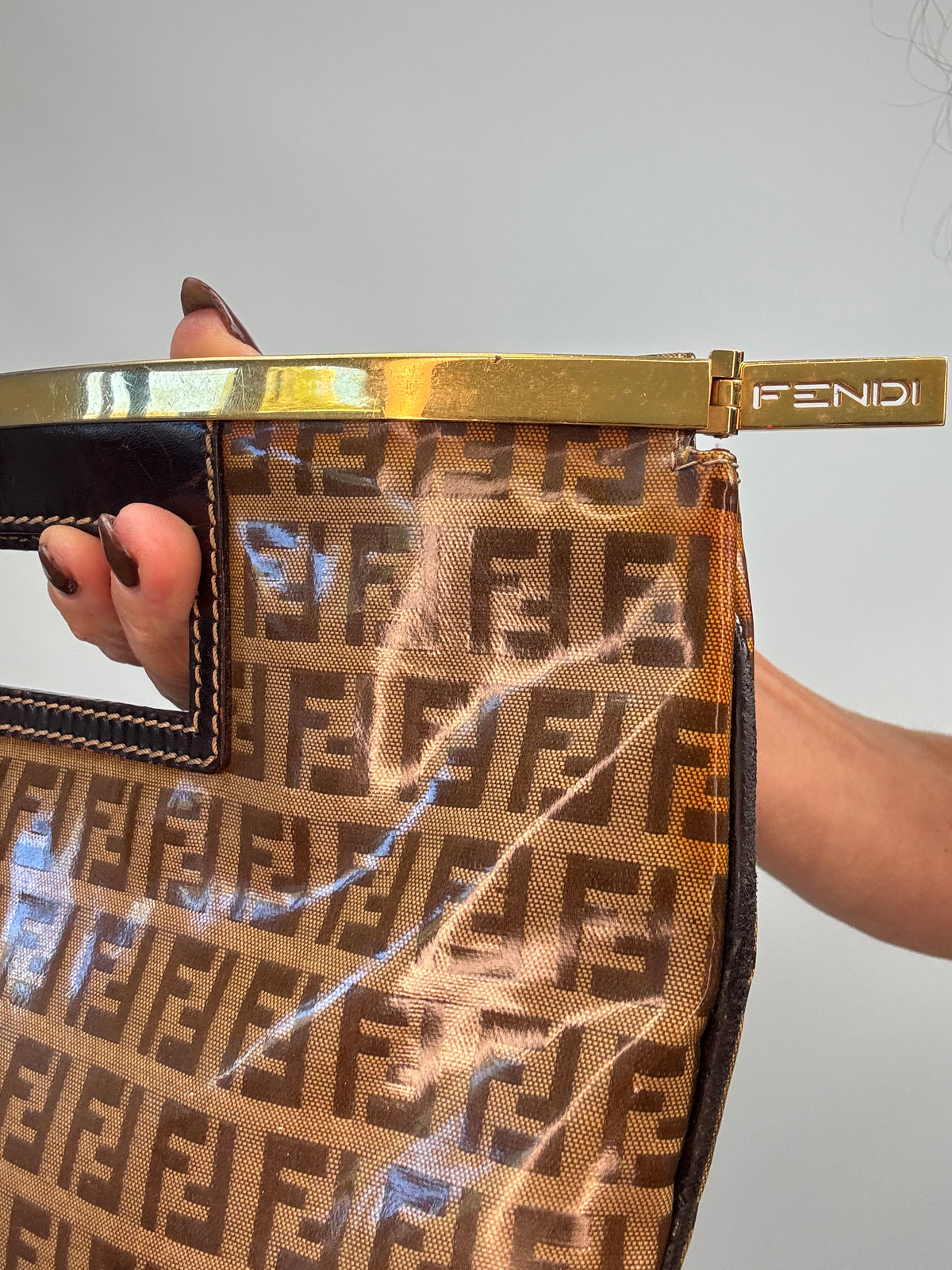Fendi Vintage Zucca Monogram Coated Canvas Cutout Handle Tote — Tobacco Brown.