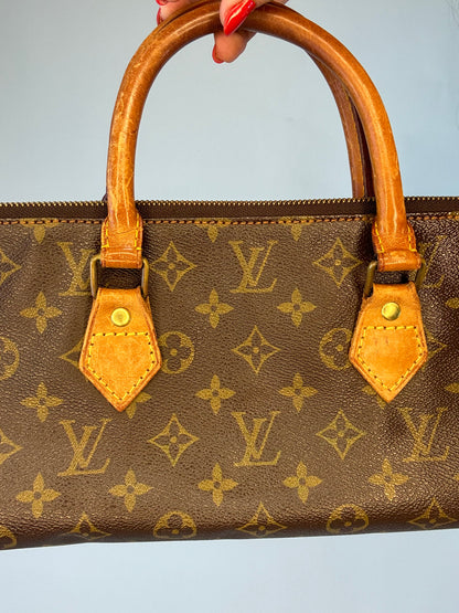 Louis Vuitton Triangle Sac Rare Monogram East to West Bag