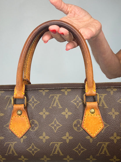 Louis Vuitton Rare Monogram Triangle Sac