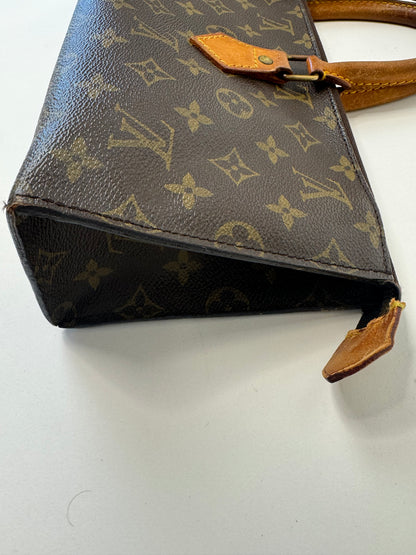 Louis Vuitton Rare Monogram Triangle Sac