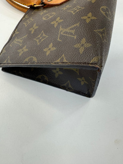 Louis Vuitton Rare Monogram Triangle Sac