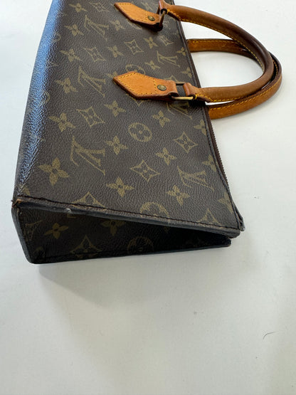 Louis Vuitton Rare Monogram Triangle Sac