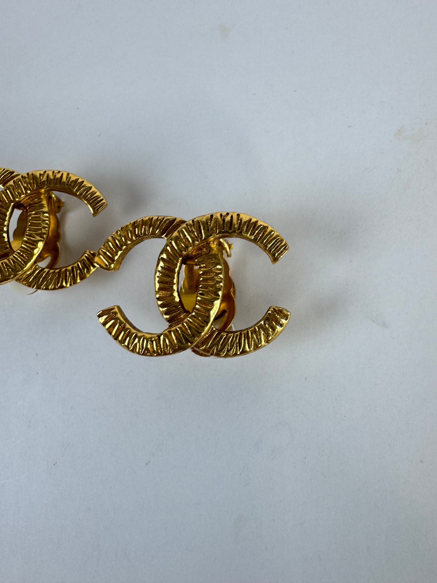 Chanel 1980 Hammered CC Logo Earrings