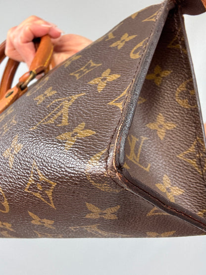 Louis Vuitton Monogram Triangle Sac