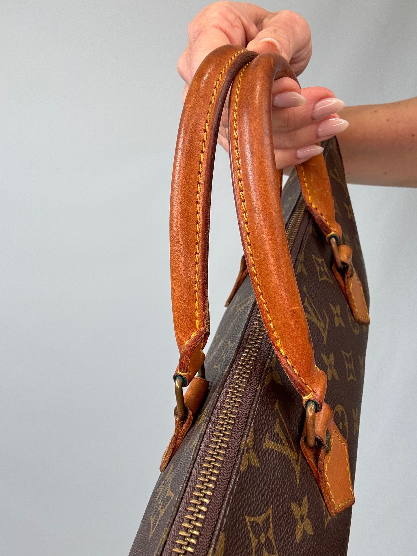 Louis Vuitton Monogram Triangle Sac