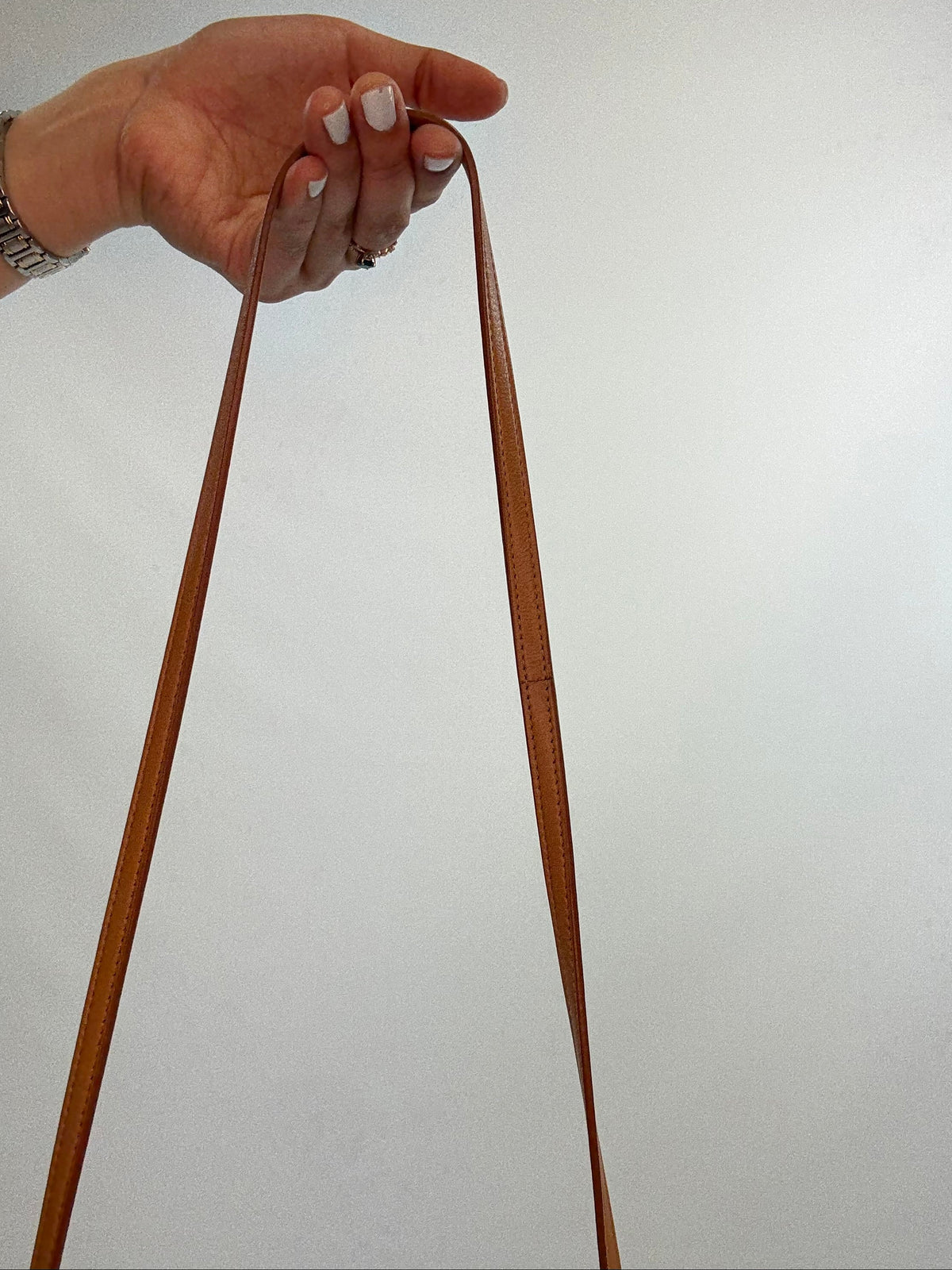 Loewe Women’s Cylinder Leather Bracelet Pouch — Caramel Tan.
