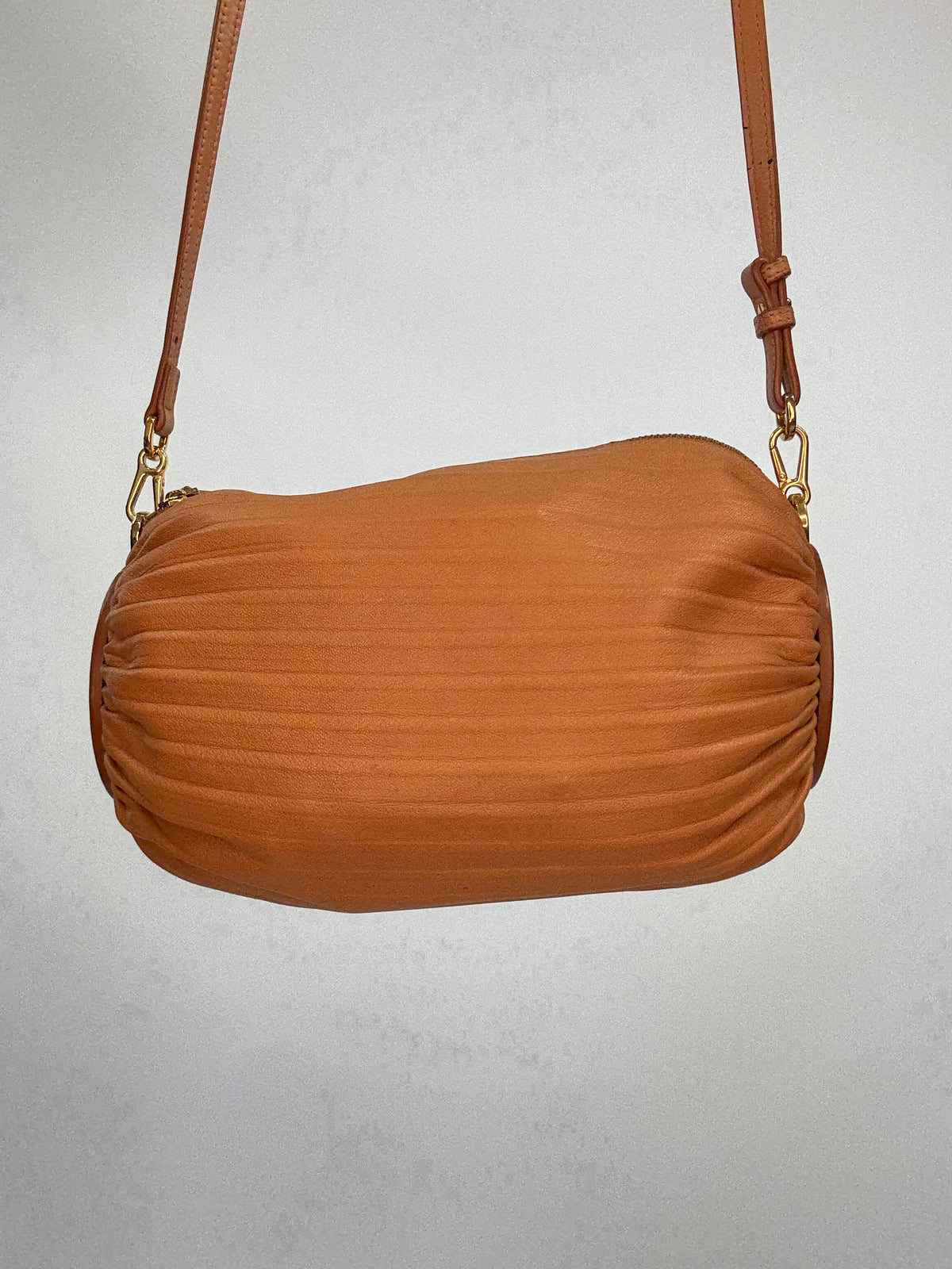 Loewe Women’s Cylinder Leather Bracelet Pouch — Caramel Tan.