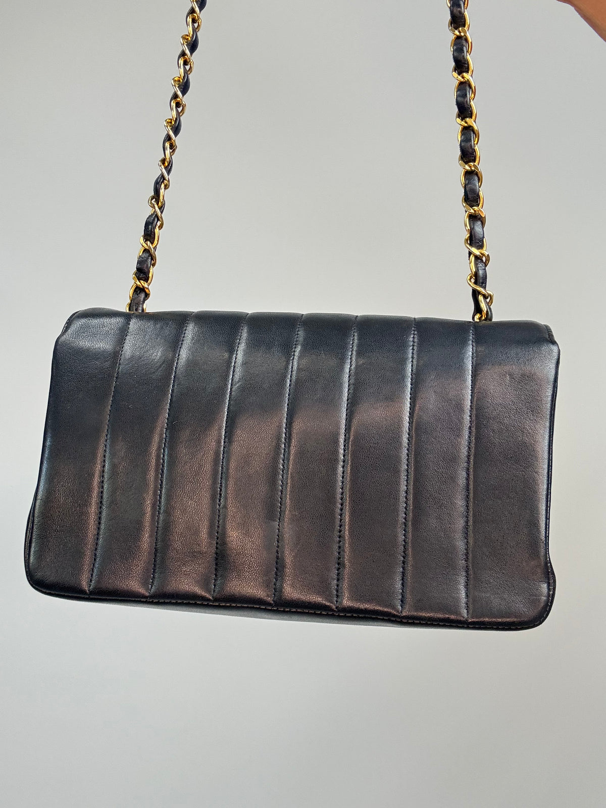 Chanel  Black Vertical Quilted Lambskin Single Flap Bag