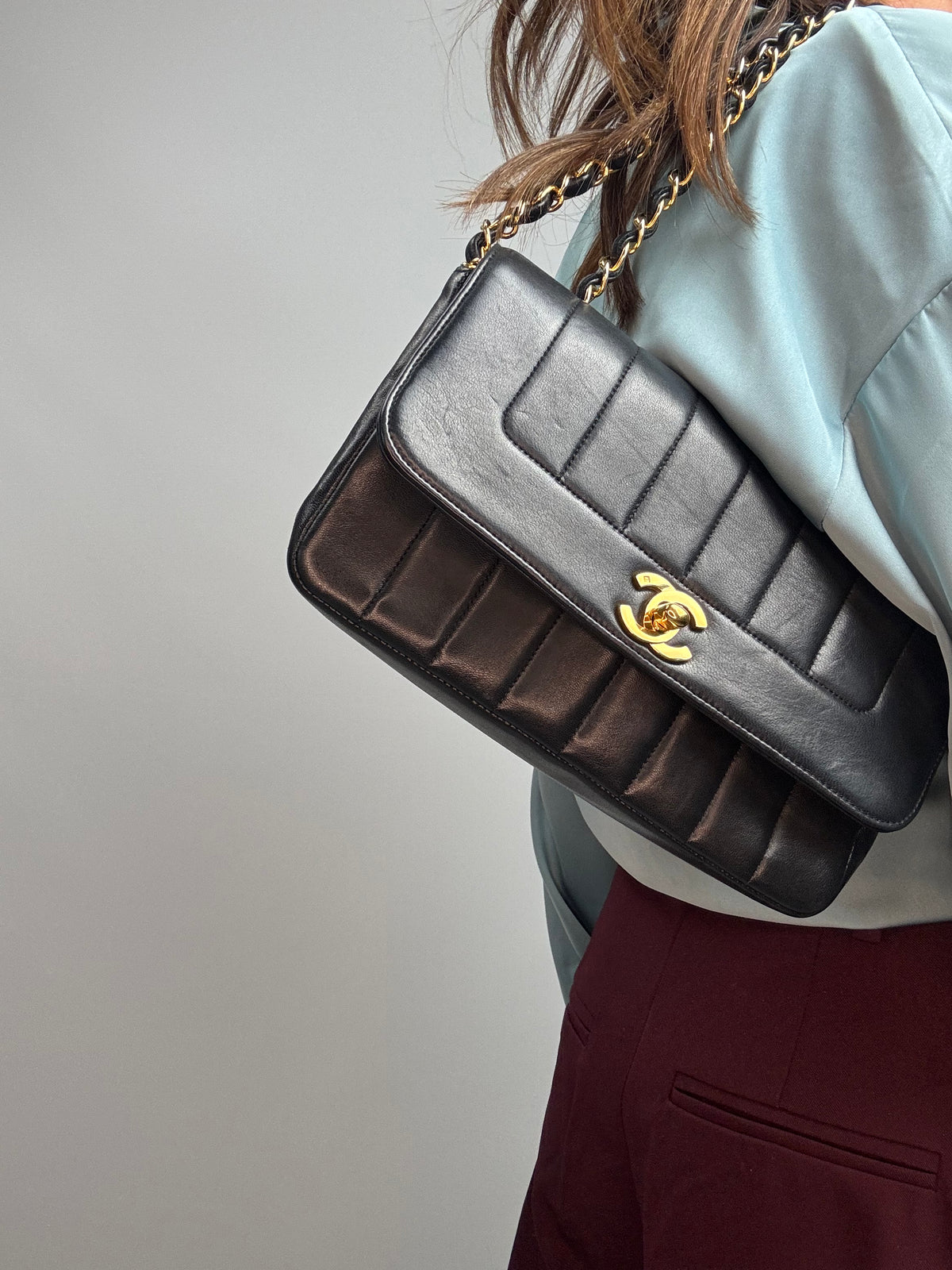 Chanel  Black Vertical Quilted Lambskin Single Flap Bag