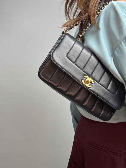 Chanel  Black Vertical Quilted Lambskin Single Flap Bag