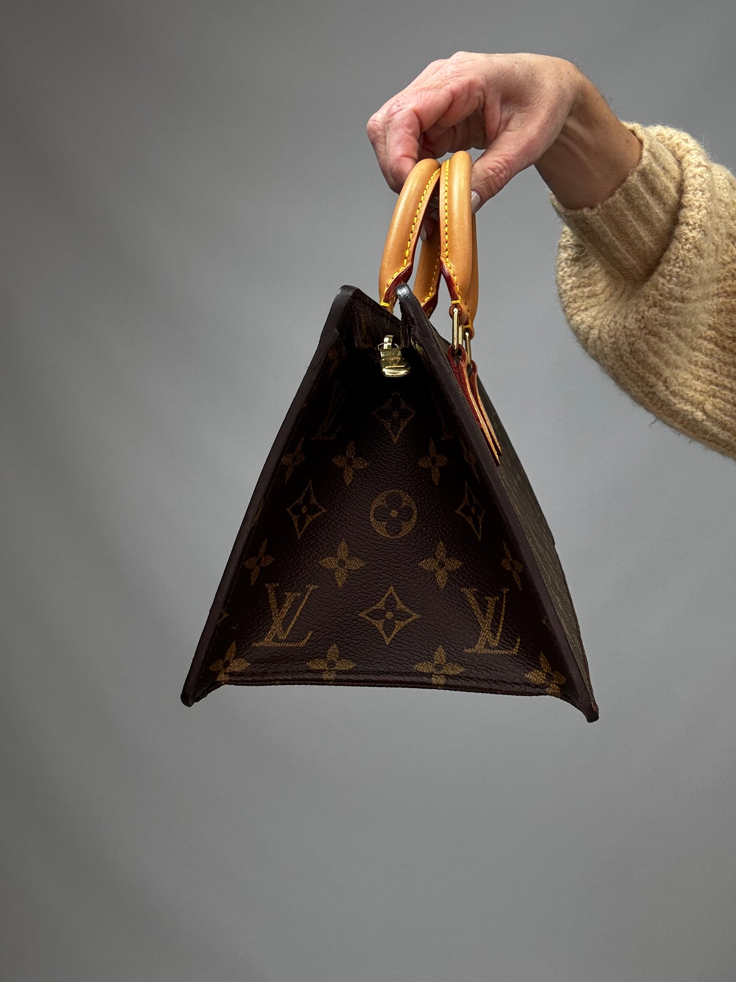 Louis Vuitton Monogram Triangle Sac