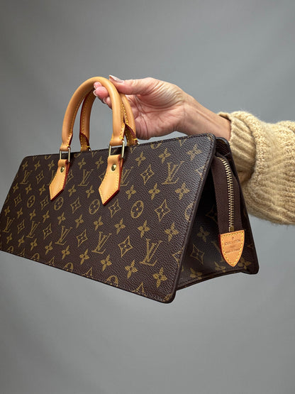 Louis Vuitton Monogram Triangle Sac