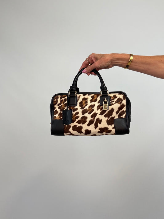 Loewe Amazona 28 bag in leopard-print calf hair and black leather. Front of Bag