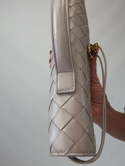 Bottega Veneta Andiamo Clutch top left of handbag