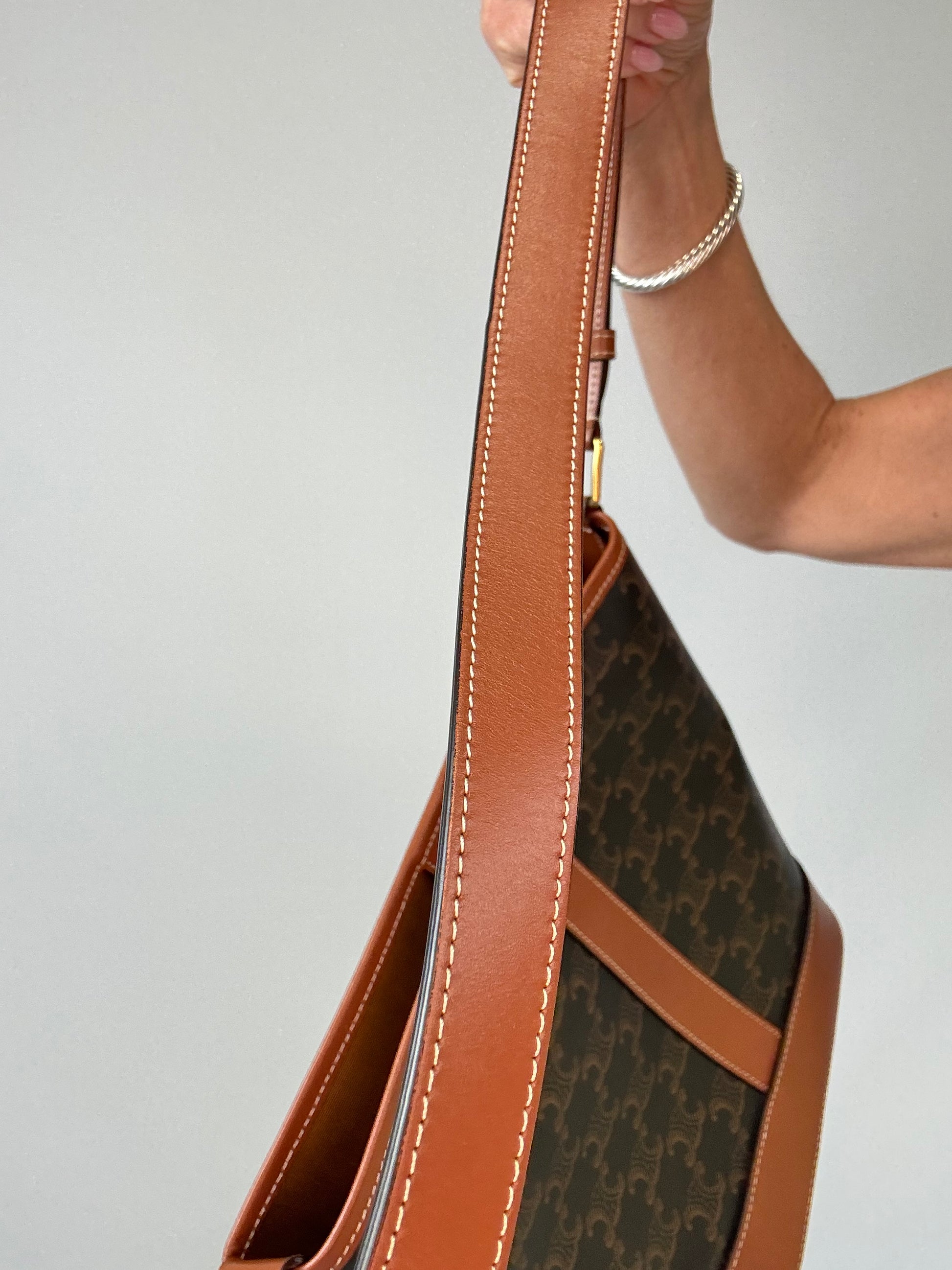Celine Triomphe Bucket Bag top of strap