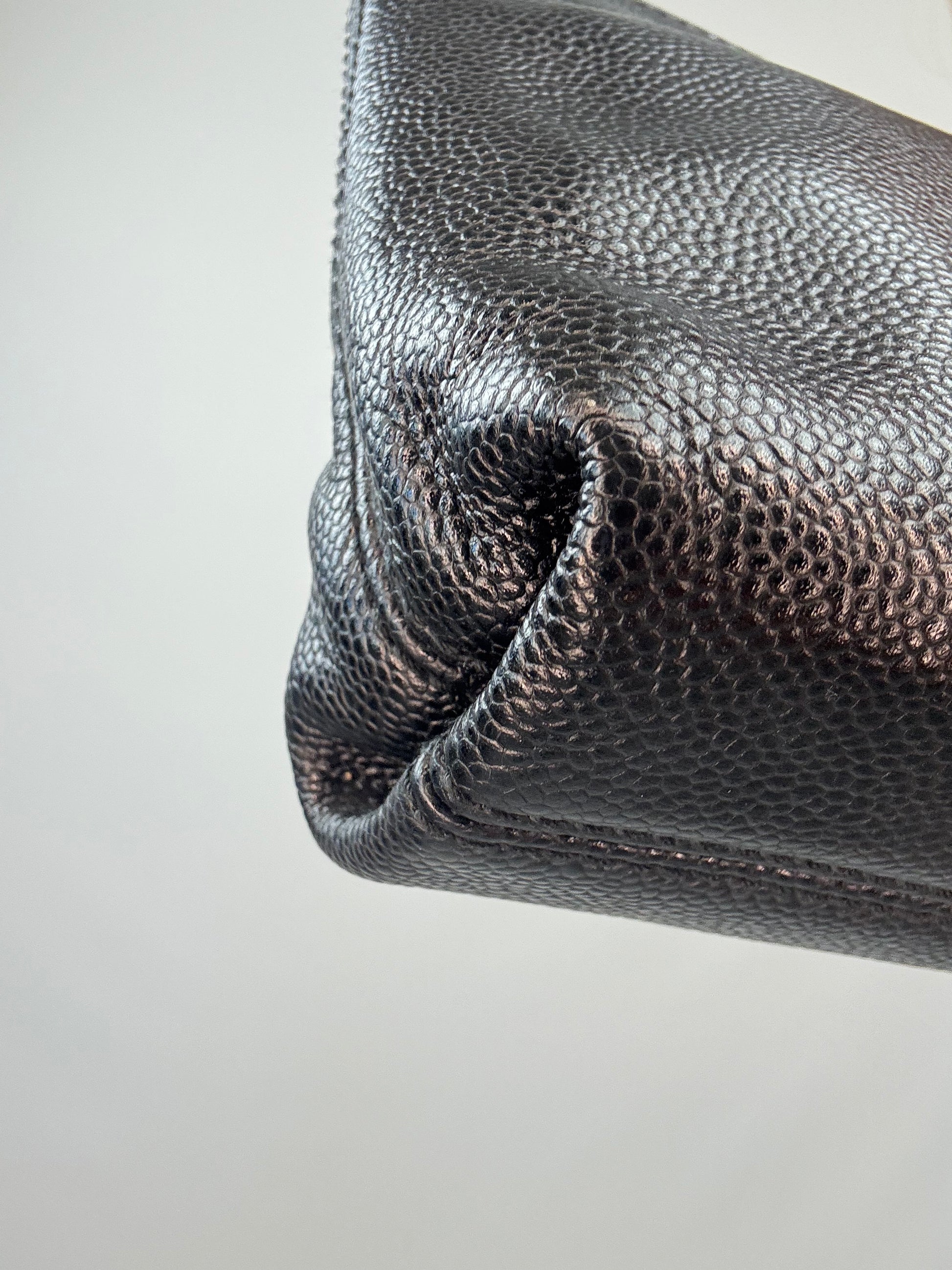 Chanel Black Caviar Resin Oversized XL CC Clutch back left bottom corner
