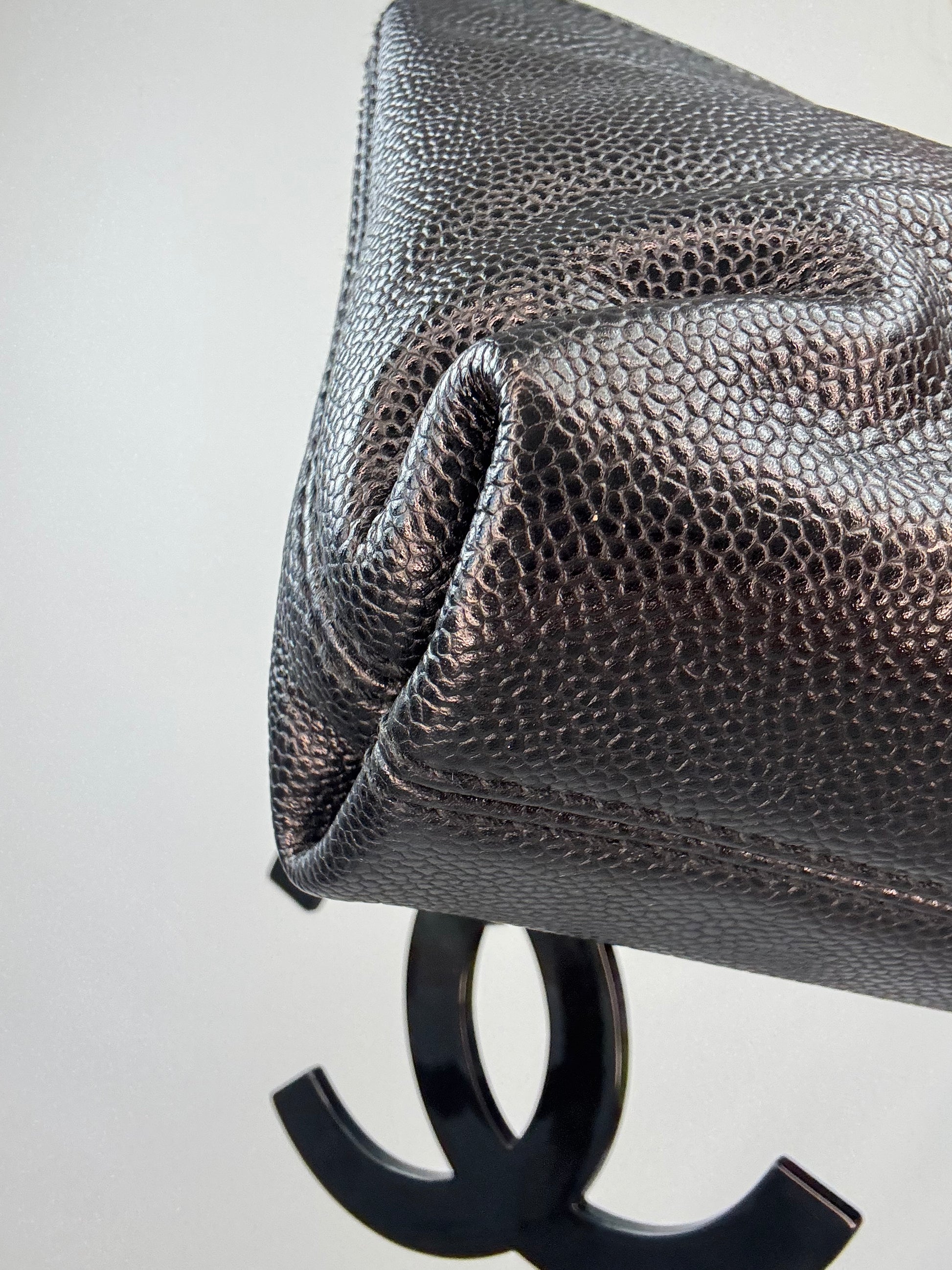 Chanel Black Caviar Resin Oversized XL CC Clutch front left bottom corner