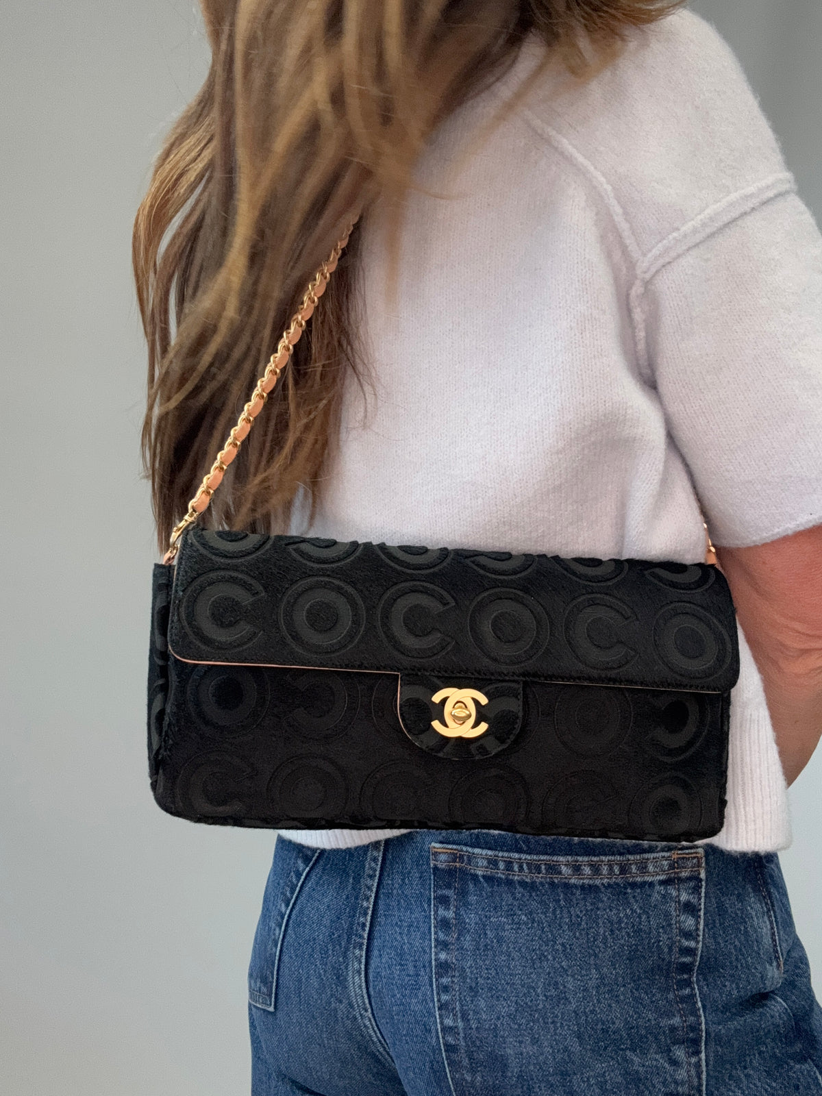 Chanel Black Pony Hair Coco East West Flap Bag modeled