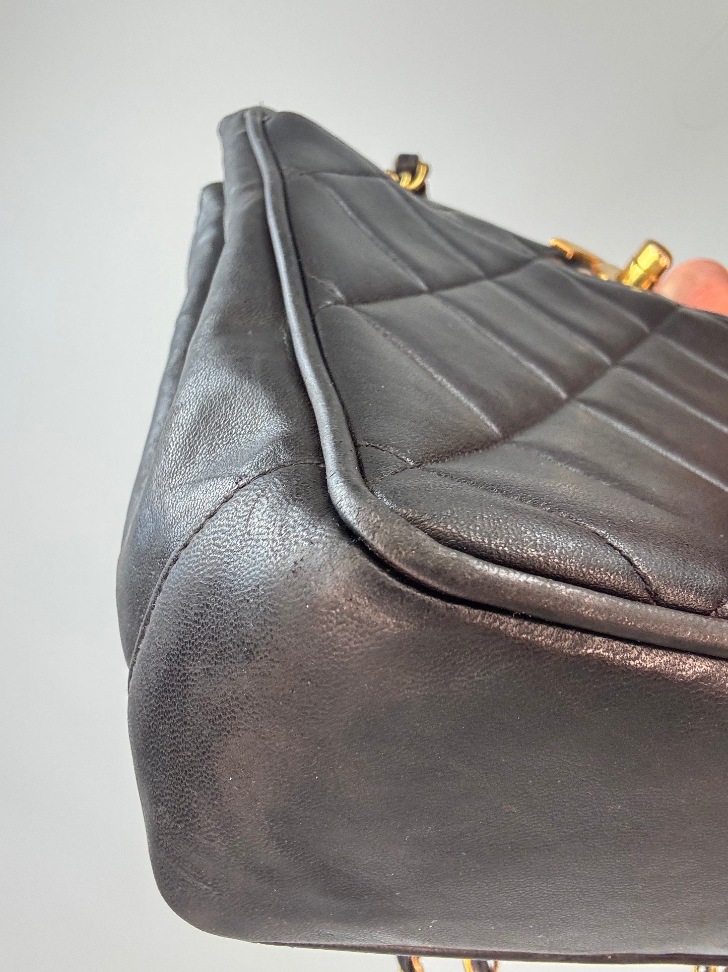 Chanel Black Quilted Caviar Leather CC Shoulder Bag front left bottom corner