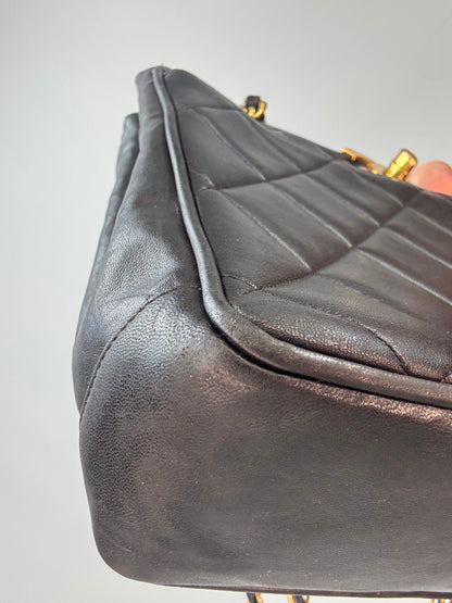 Chanel Black Quilted Caviar Leather CC Shoulder Bag front left bottom corner