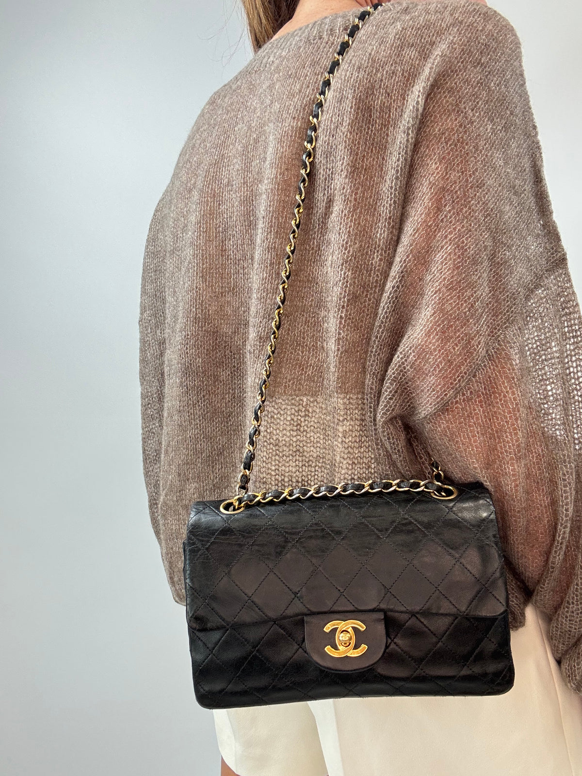 Chanel Black small  Quilted Lambskin Classic Double Flap Bag modeled